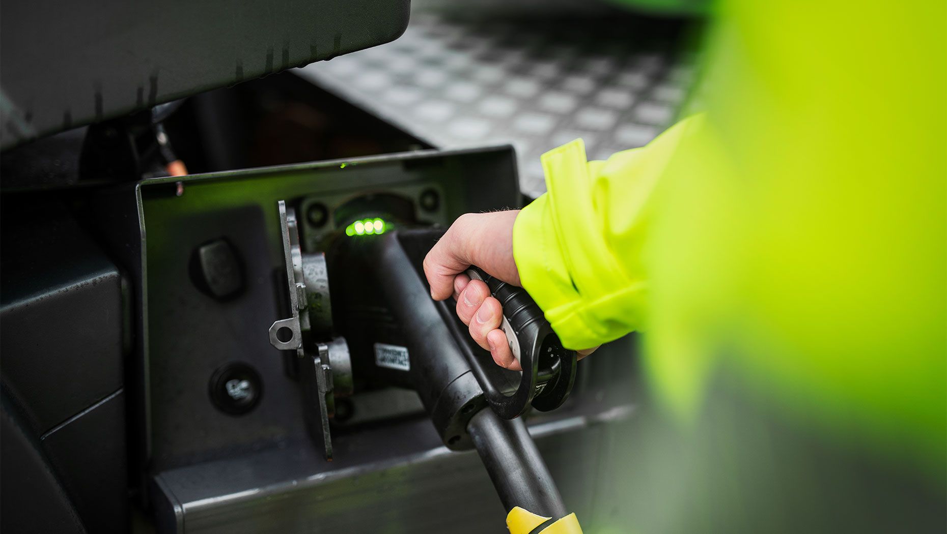 Hand charging a truck.