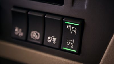 Pagalbinės nukrypimo nuo važiuojamosios juostos įspėjimo sistemos mygtukas