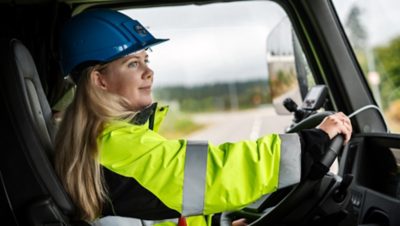 Ebba Bergbom Wallin, Electromobility Business Manager at Volvo Trucks, behind the wheel of the electric Volvo FMX.