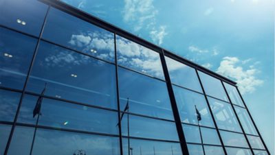 Volvo Group glass building reflecting the sky