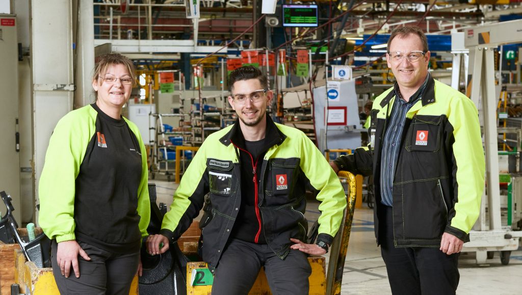 Tre anställda vid fabriken i Bourg