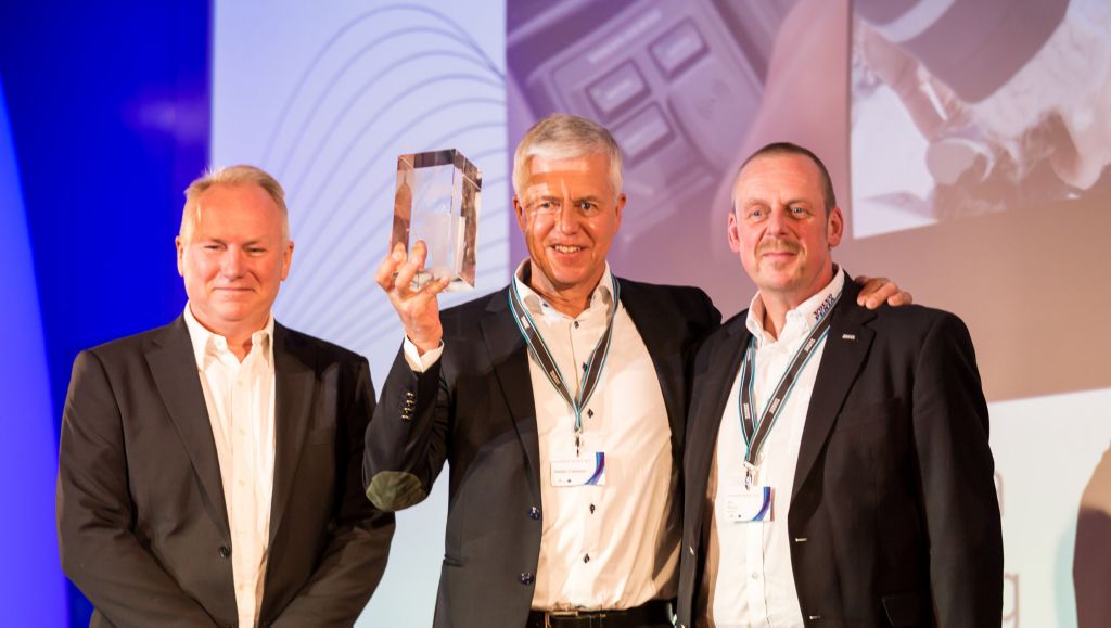 Johan Wästeräng, Stefan Carlsson and Jan Wiese receiving the prize