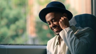 smiling-passenger-with-hat