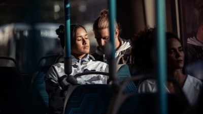 Passenger relaxing on board the Volvo 7900 Electric