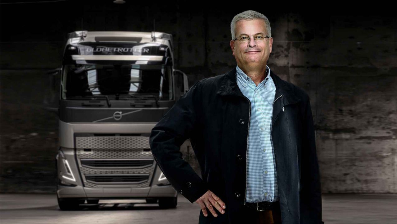 Tomas Thuresson, Commercialisation Manager, stands in front of the new Volvo FH with I-Save