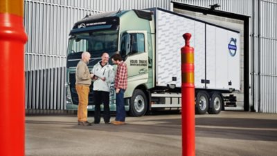 Volvo trucks training overview people in front of truck