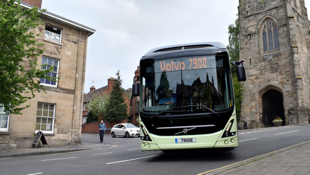 Volvo bus 7900 in city traffic