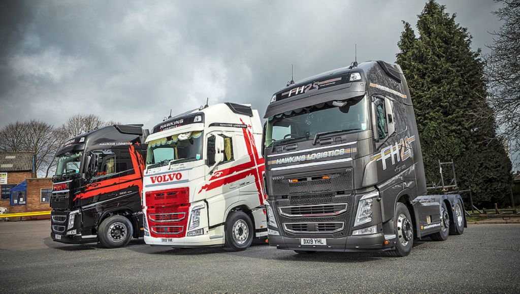 Three new Volvo FH tractors provide a perfect colour match at Hawkins Logistics