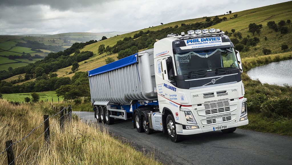 A new FH 6x2 Lite pusher axle tractor unit continues strong links to Volvo Trucks for Phil Davies Haulage Ltd