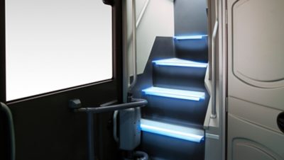 Coach interior stairs with lights