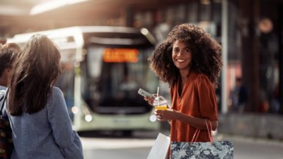 1860x1050-woman-at-bus-stop.jpg