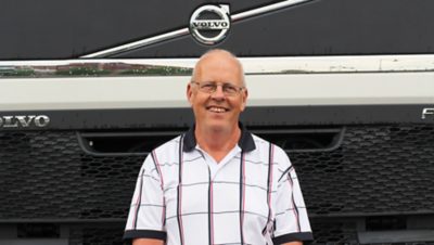 Man standing in front of Volvo FH