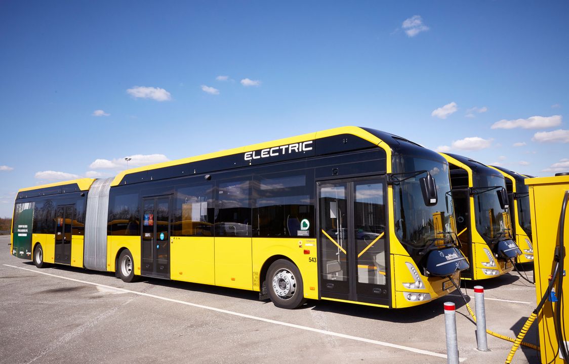 Yellow Volvo 7900 Electric Articulated when charging