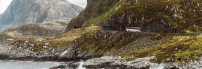  Scenic view of costal road with mountain in the background