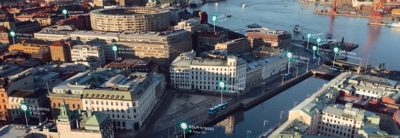 Volvo Connect – Luftbild von Stadt mit Bussen