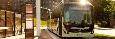 A Volvo electric bus at a bus stop