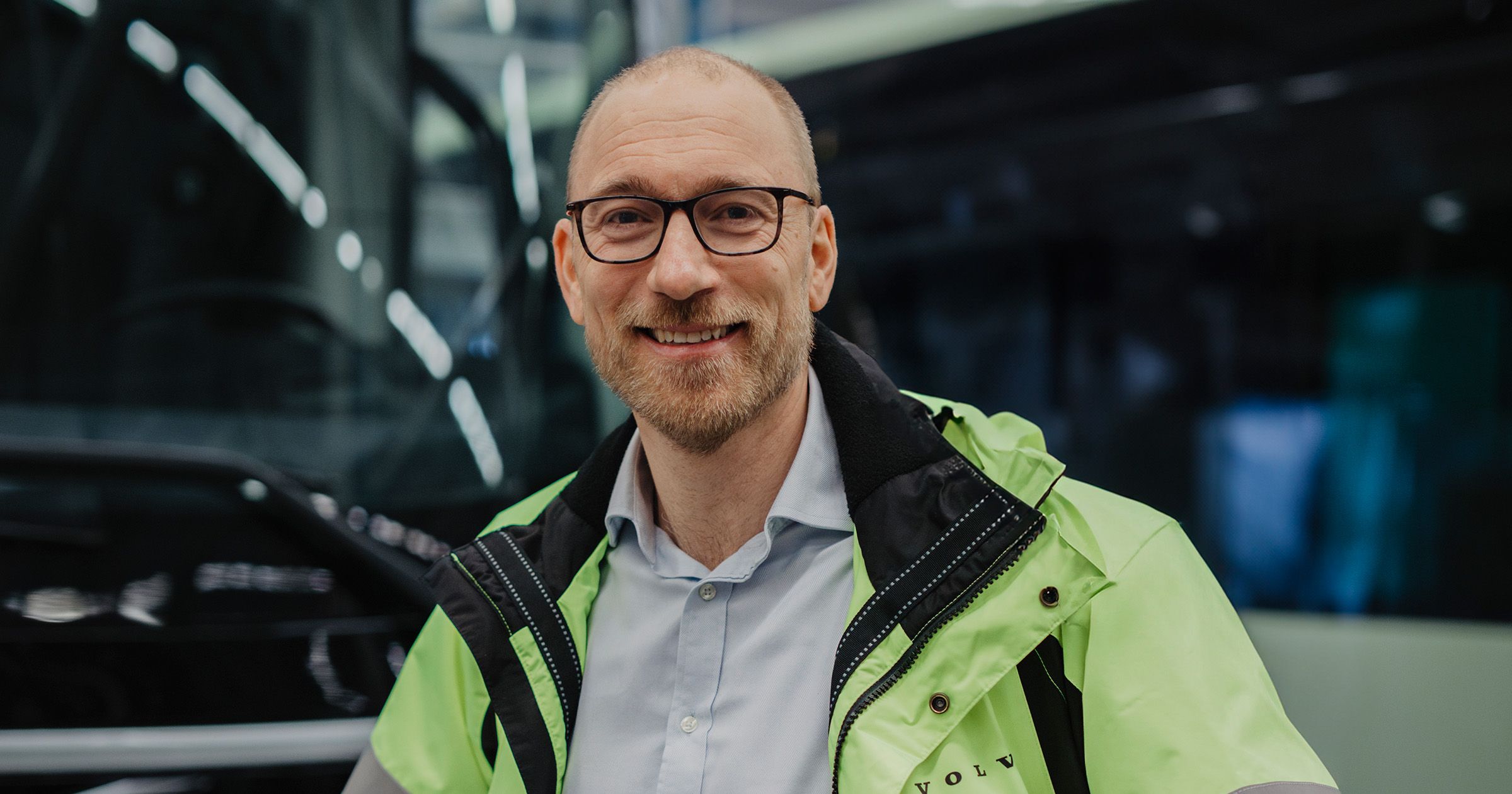 Thomas Forsberg, Head of Safety, standing in front of a Volvo bus