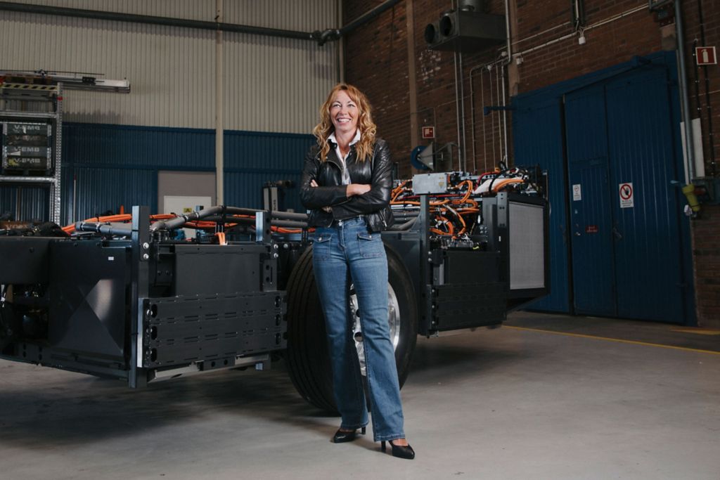 Carina Borelius, Vice President Services, Solutions & Electromobility, Business Unit Chassis at Volvo Buses in front of a BZR chassis.