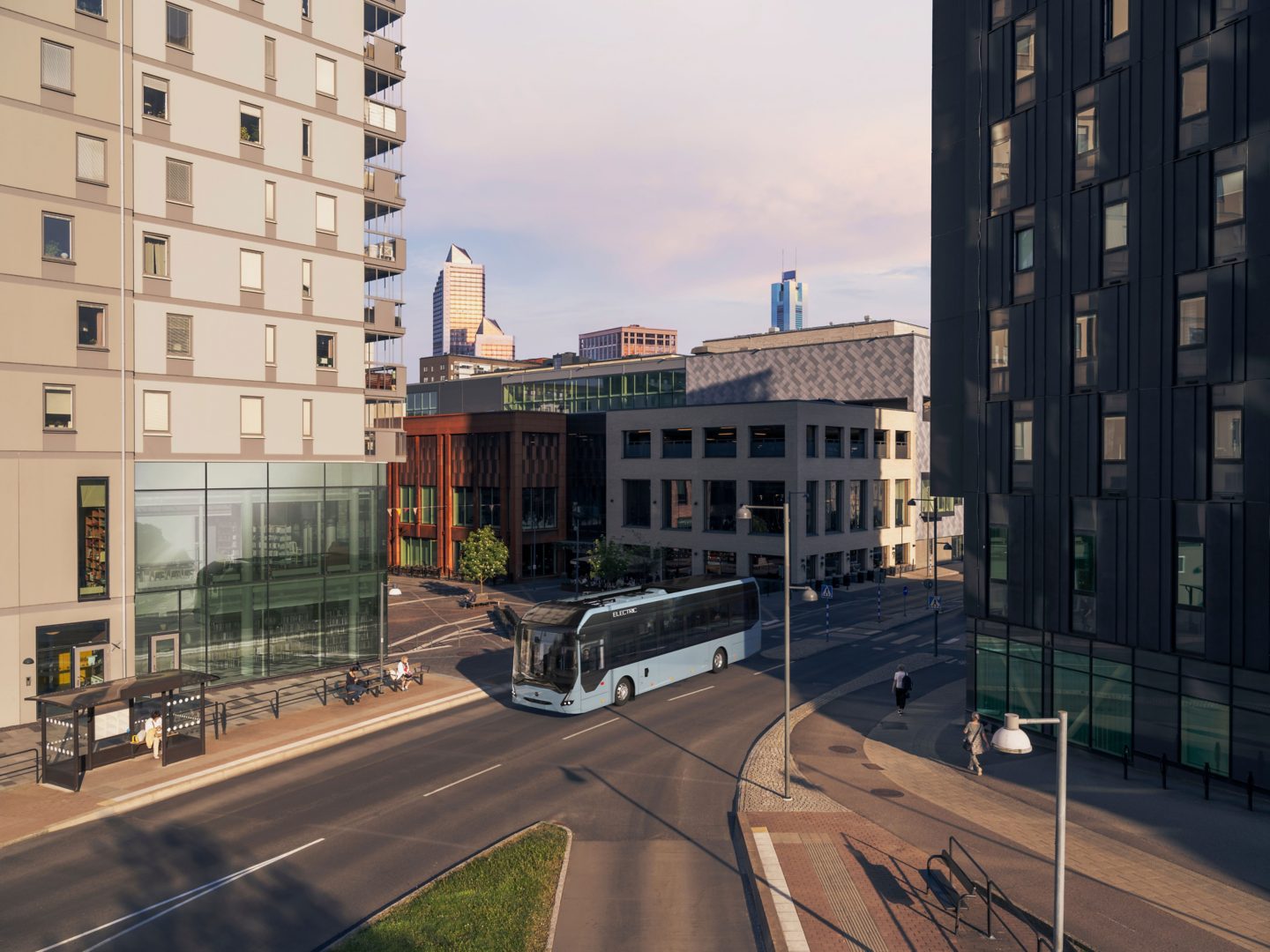 A Volvo 7900 Electric approaching a bus stop