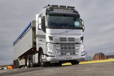 Archway Haulage has taken delivery of its first new truck in five years – a Volvo FH 500 Globetrotter Lite 6x2 tractor unit. Sam Archer is pictured in one of the images.