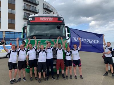 Staff from Crossroad Truck & Bus in Birstall before and during the coast-to-coast ride.