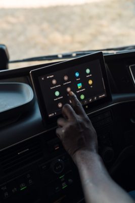 Driver adjusting temperature in the cab