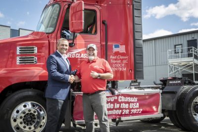 Spencer Webster, president of Red Classic hands over keys to a Mack® Anthem model to driver Steve Coleman of Nashville, Tennessee.