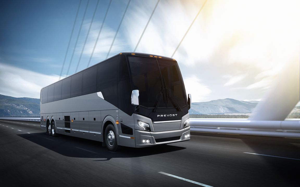 An all-new H3-45 coach on the road.