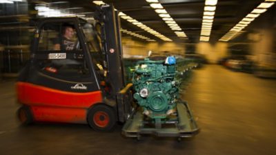 Engine transported by forklift.