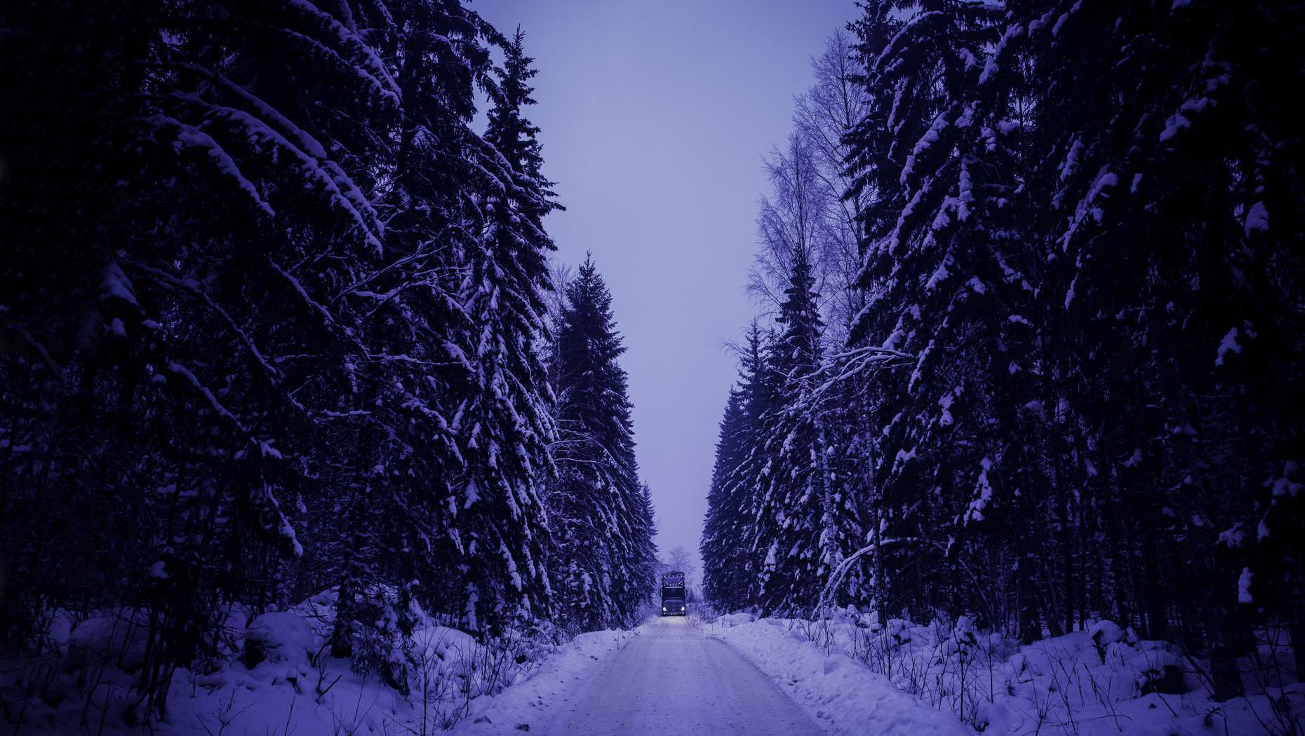 Saku Simpanens truck on an icy forest road in Finland.