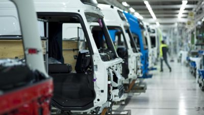 Cabs on assembly line.