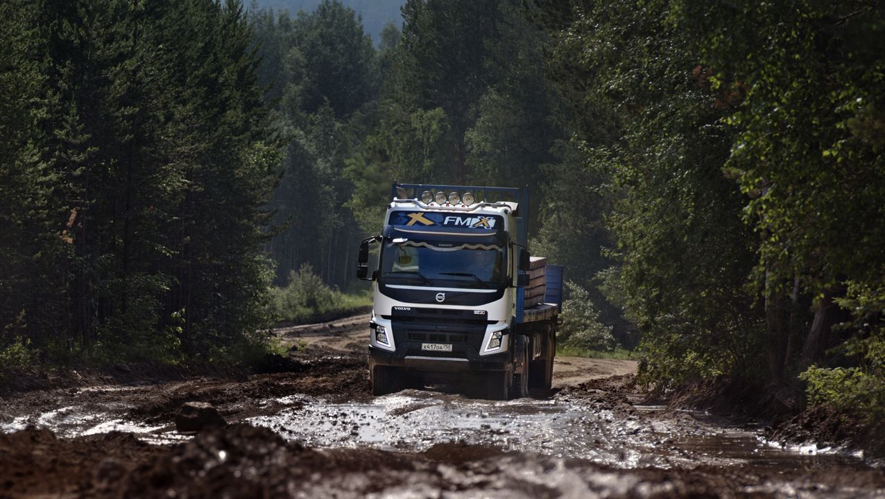 Volvo FMX driving through mud