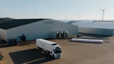 A truck driving through a landscape