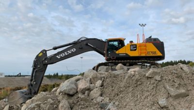 Volvo excavator digging at construction site in Eskilstuna, Sweden
