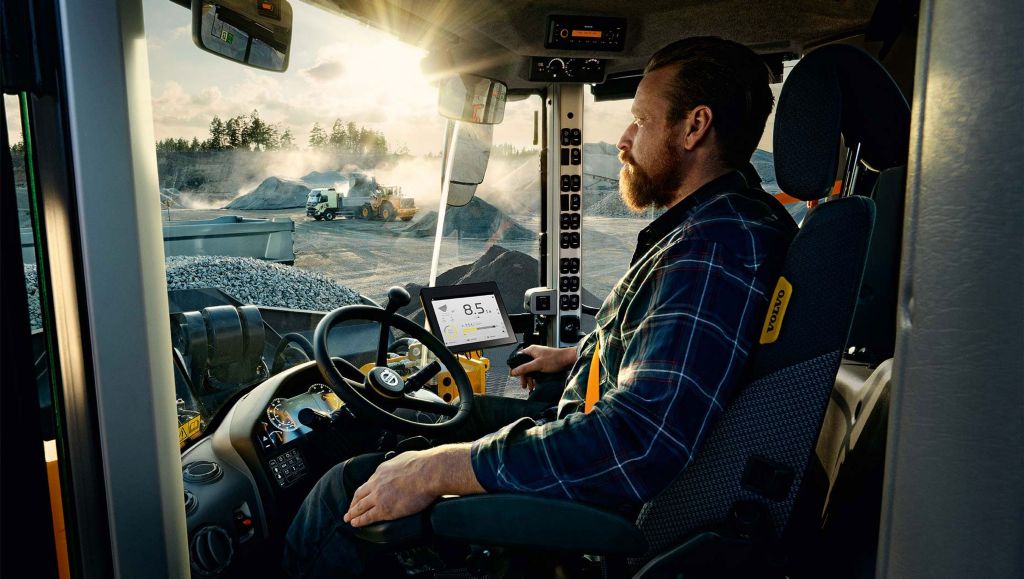 Man driving a Volvo CE product