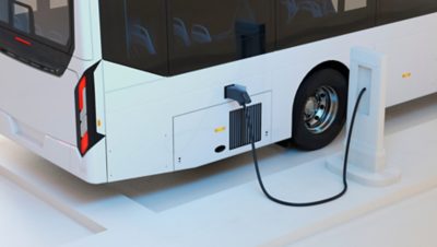 A Volvo BZL Electric single-decker, with a charging cable connected.