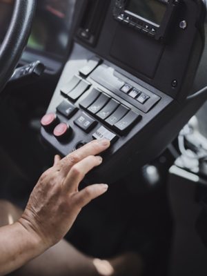 Hand-over button in an autonomous bus