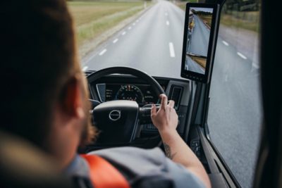 Woman driving a truck in an intersection