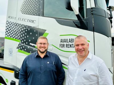 Paul Uys, Managing Director of Volvo Financial Services South Africa and Eric Parry Sustainable Solutions Manager at Volvo Trucks South Africa with some of the electric trucks available for rental.
