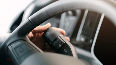 Close-up of steering wheel and control stalk in an electric Volvo coach