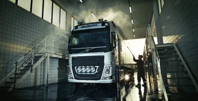 A truck being power washed