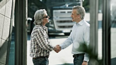 Volvo financing trucks handshake