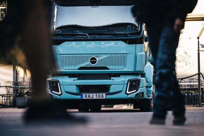 Volvo FM Electric cab next to a garage door