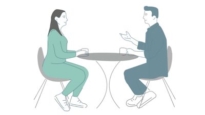 Mann und Frau an Tisch