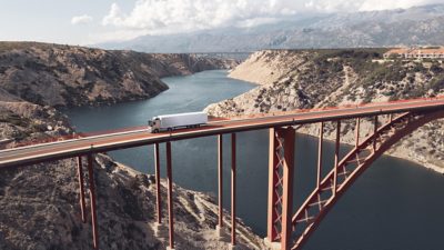 Truck driving on a bridge