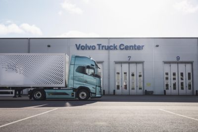 A driver delivers a Genuine Volvo Part to a customer