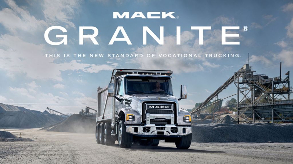 Mack truck in a construction site with the text "Mack Granite this is the nw standard of vocational trucking" on the image