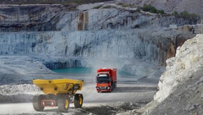 Volvo Autonomous FH Truck and TA15 dumper in quarry and mining