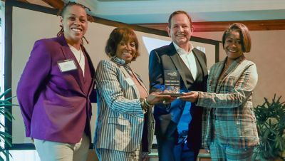 Volvo Group North America received a 2024 Change Agent award from the Greensboro Chamber of Commerce at an awards ceremony April 30th. From left, Ivey Ghee, co-emceed of the Greensboro Chamber of Commerce Other Voices Awards 2024 program, Volvo Trucks North America People & Culture Director Iris Austin, President of Volvo Trucks North America Peter Voorhoeve, and Vice President of People & Culture Volvo Financial Services North America Region Jacquelyn Johnson.