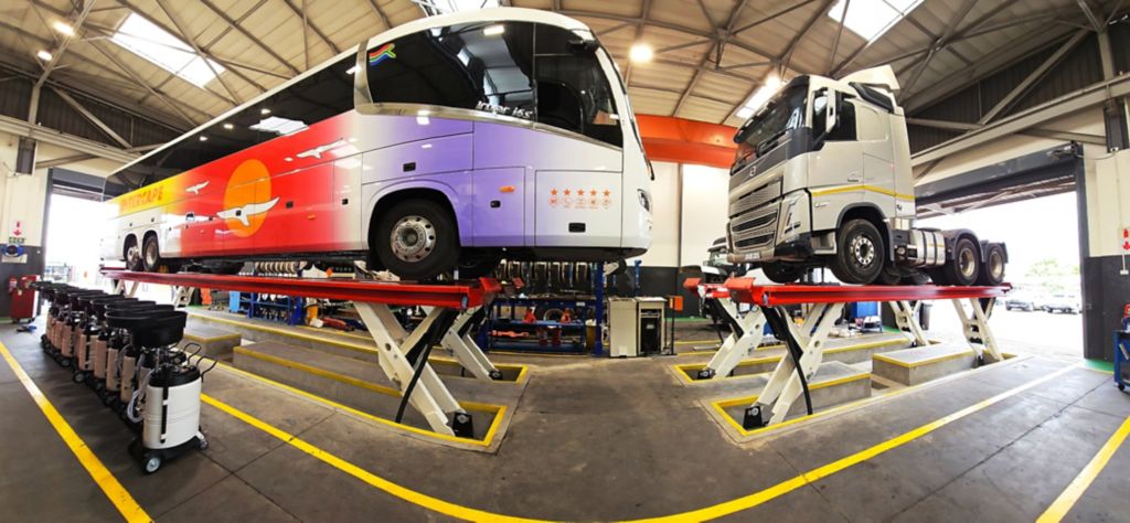 2 trucks on a raised platform